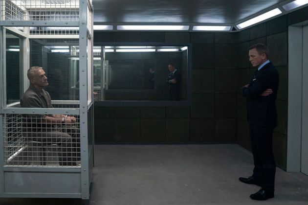 James Bond (Daniel Craig) visits Blofeld (Christoph Waltz) in his prison cell in 