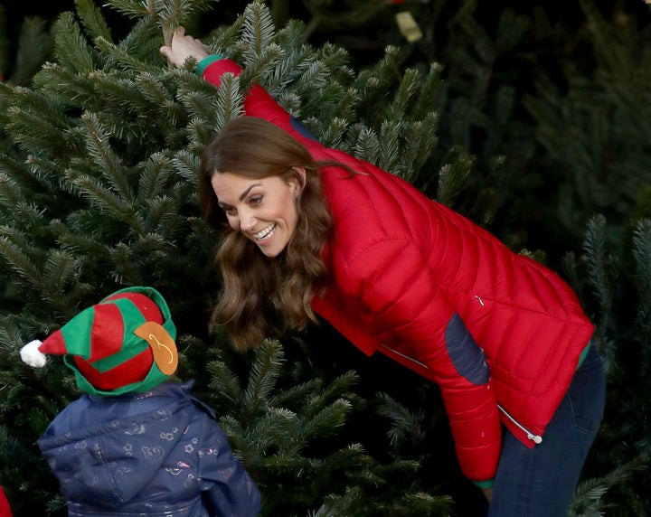 Kate spent time helping the children pick out Christmas trees. 