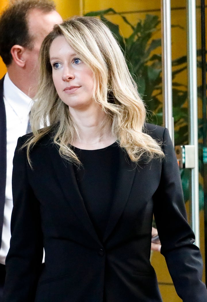 Elizabeth Holmes leaves court on July 17, 2019 without her signature heavy makeup.