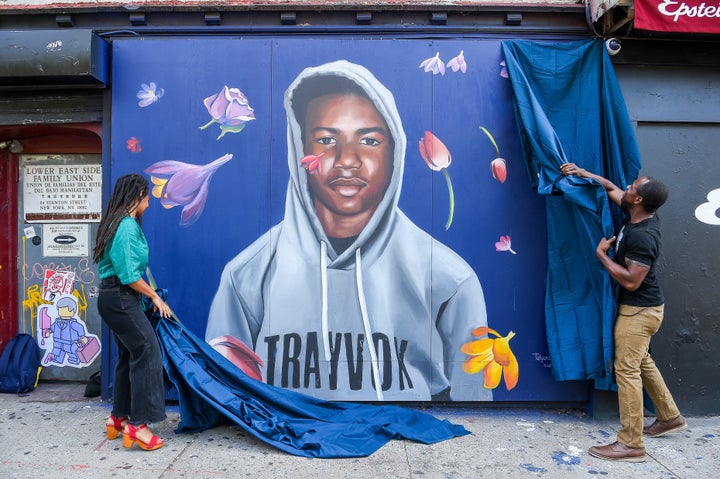 George Zimmerman was acquitted of murder in the death of Trayvon Martin, who's seen on a New York City mural in 2018.