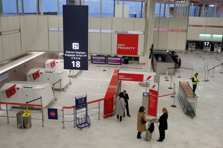 A baggage drop-off desk is pictured empty at the Orly airport, south of Paris, on Dec. 5, 2019. 