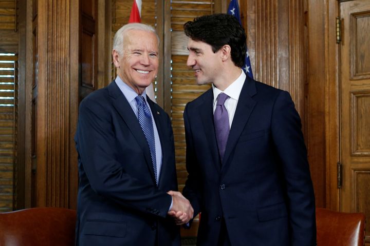 Canada's Prime Minister Justin Trudeau (R) shakes hands with U.S. Vice President Joe Biden during a meeting in Trudeau's office on Parliament Hill in Ottawa on Dec. 9, 2016.