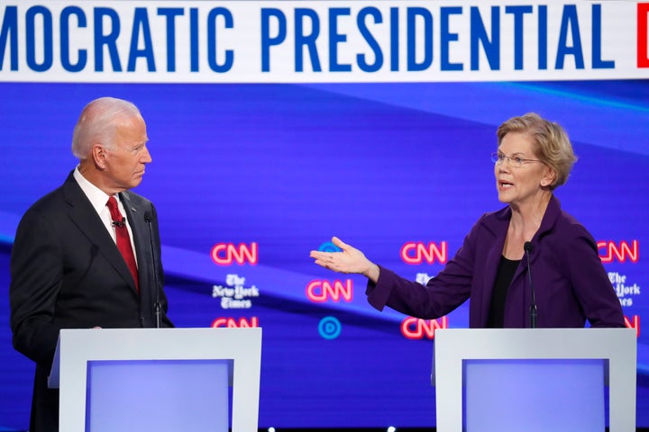 Joe Biden and Elizabeth Warren participate in a Democratic presidential primary debate hosted by CNN/New York Times at Otterbein University, on Oct. 15, 2019, in Westerville, Ohio. 