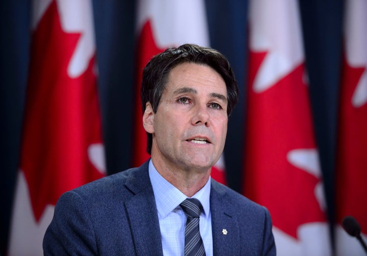 Dr. Eric Hoskins, Chair of the Advisory Council on the Implementation of National Pharmacare, speaks during a press conference at the National Press Theatre in Ottawa on June 12, 2019.