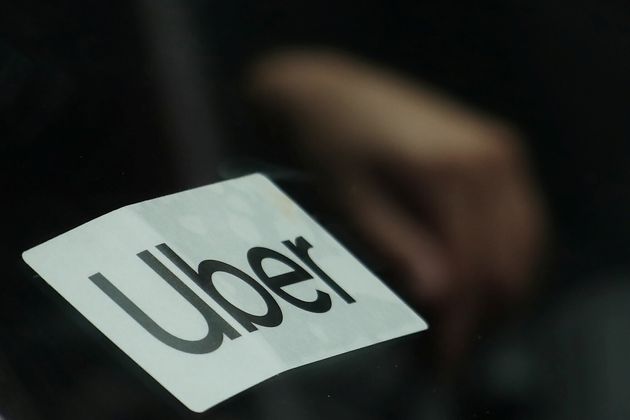 Uber sign is seen on a car in New York, U.S., April 12, 2019. REUTERS/Shannon Stapleton