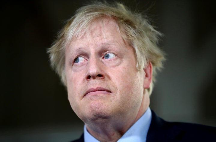 Boris Johnson during a visit with workers at the John Smedley Mill in Matlock