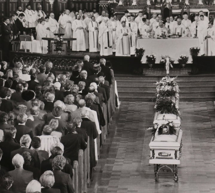 Four caskets lead to the altar where priests perform a high requiem mass for nine of the fourteen women victims of the December 6, 1989 mass shooting at Ecole Polytechnique, in Montreal on Dec. 11, 1989.