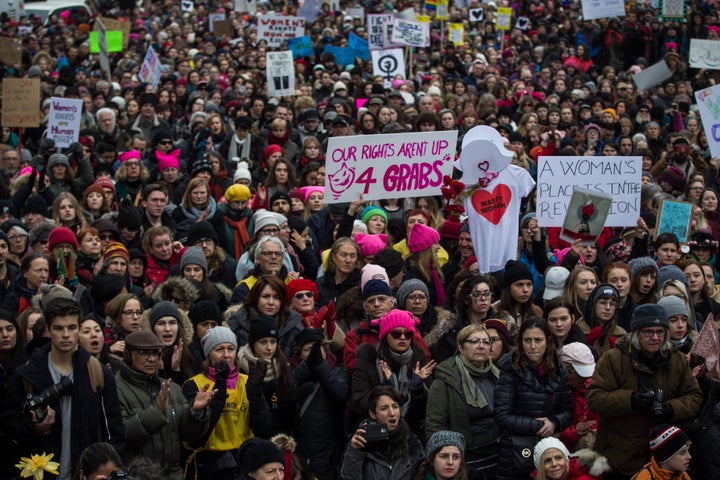 Demonstrators attend the Women's March to protest President Donald Trump, in Montreal on January 21, 2017. Thousands of people gathered in support of women's rights as thousands are doing the same in Washington, D.C. after the inauguration of Donald Trump.