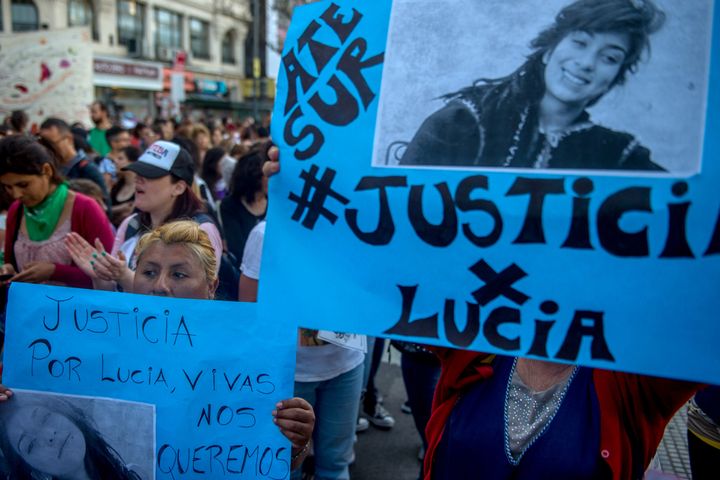 Women hold banners during a protest as part of the "Not One Less" (Ni Una Menos) movement demanding justice for the femicide of Lucia Perez on Dec. 5, 2018 in Buenos Aires, Argentina.