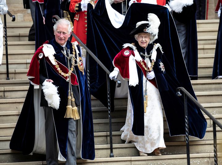 Prince Charles and Queen Elizabeth leave the Order of the Garter Service at Windsor Castle on June 17.