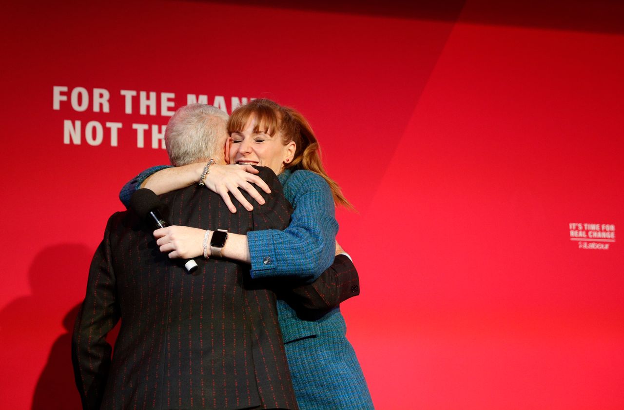 Angela Rayner embraces Jeremy Corbyn at a rally in Birmingham