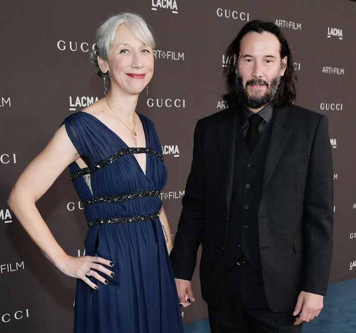 Alexandra Grant and Keanu Reeves hold hands at a Los  2019 LACMA 2019 Art + Film Gala in November.