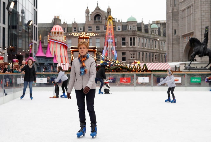 Scotland's First Minister Nicola Sturgeon ice skates at Aberdeen Christmas market