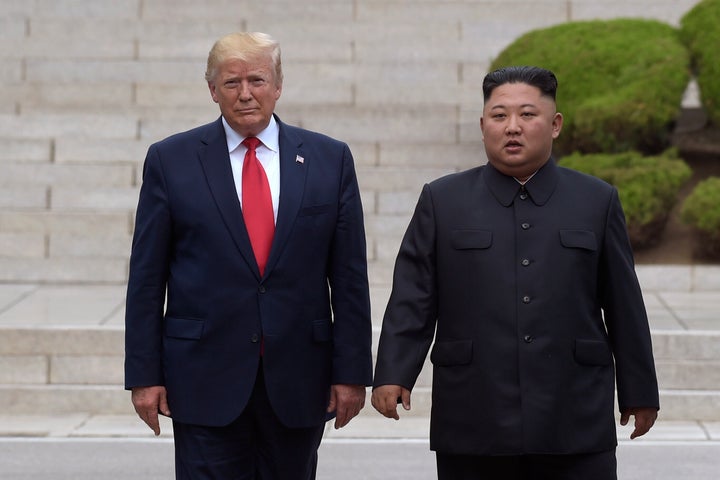 FILE - In this June 30, 2019, file photo, President Donald Trump, left, meets with North Korean leader Kim Jong Un at the North Korean side of the border at the village of Panmunjom in Demilitarized Zone.