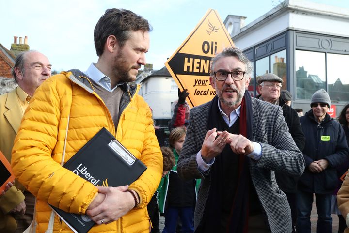 British actor Steve Coogan, right, joins Liberal Democrat candidate Oliver Henman as they canvass in the Lewes constituency, in Lewes.