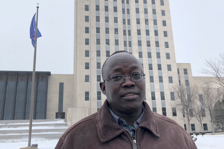 Reuben Panchol, who immigrated from Sudan to North Dakota as a child, says he hopes to tell his personal story at a meeting M
