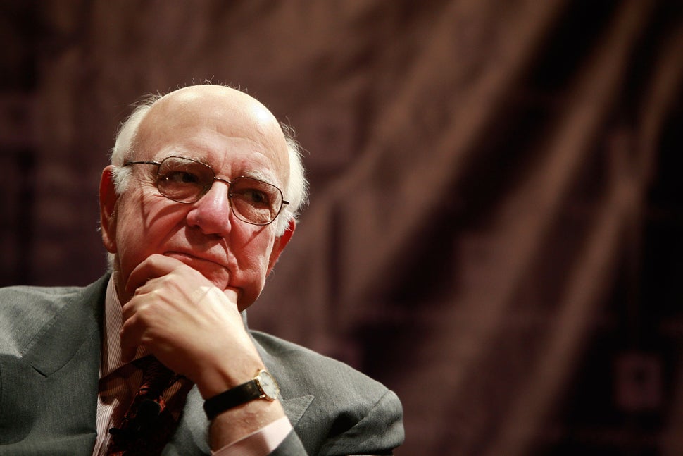 Former Federal Reserve Chairman Paul Volcker looks on at a forum on multilateralism and global issues at New York University