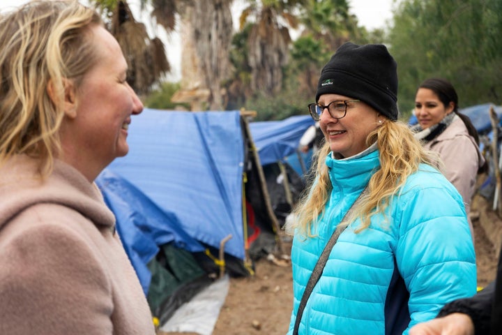Jodi Goodwin (center<strong>) </strong>at the refugee camp in Matamoros, Mexico.