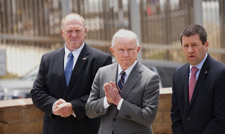Then-Attorney General Jeff Sessions and Thomas Homan, left, then head of Immigration and Customs Enforcement, hold a news conference May 7, 2018, in San Ysidro, Calif., on the Trump administration's hard-line immigration policy.