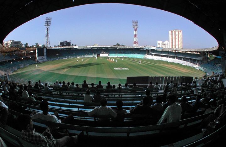 A few spectators watch England field against a Mumbai Cricket Association President's XI at the Wankhede Stadium, Mumbai, India,. (Photo by Rebecca Naden - PA Images/PA Images via Getty Images)
