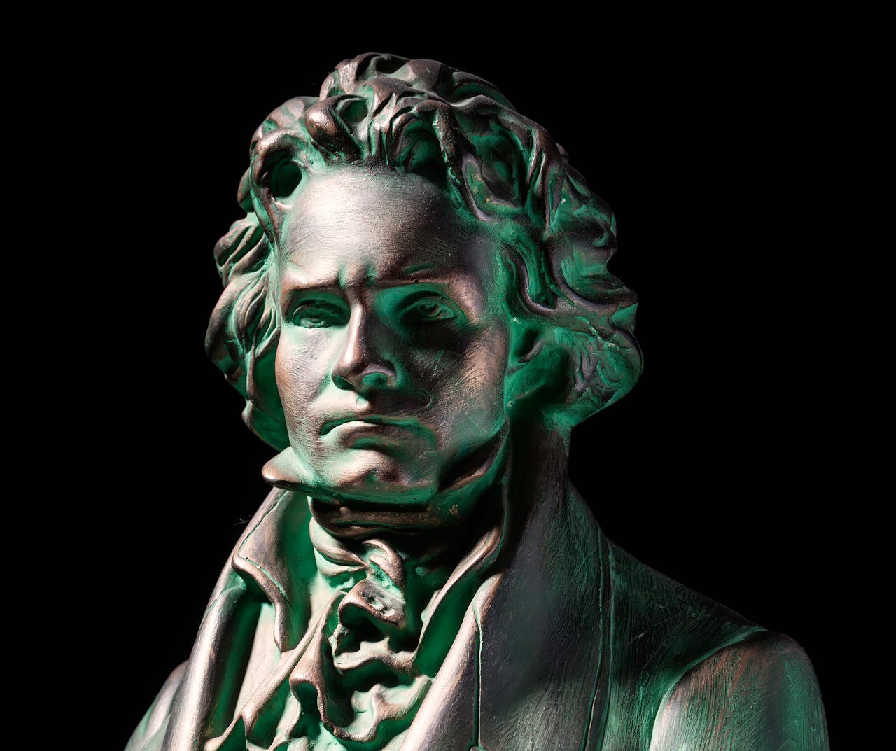 beethoven sculpture on black background