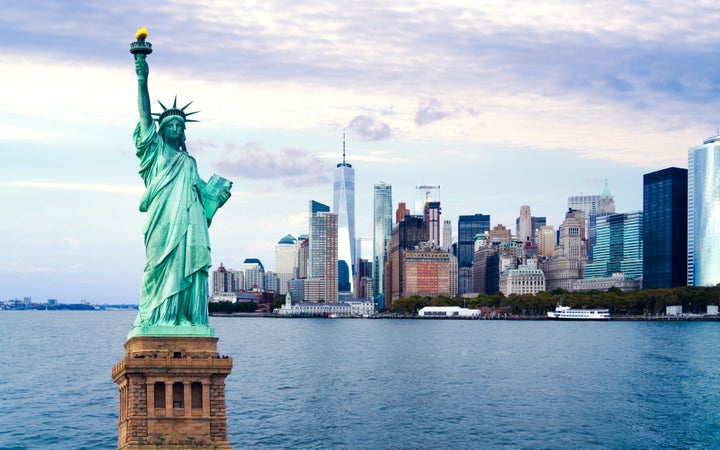 The Statue of Liberty and Lower Manhattan skyline.