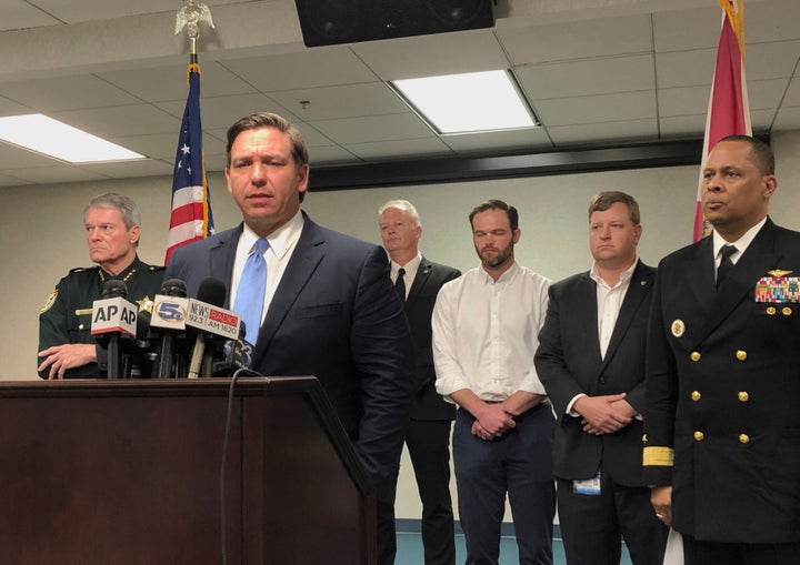 Florida Gov. Ron DeSantis speaks to the media after a visiting the scene where a Royal Saudi Air Force officer killed three A