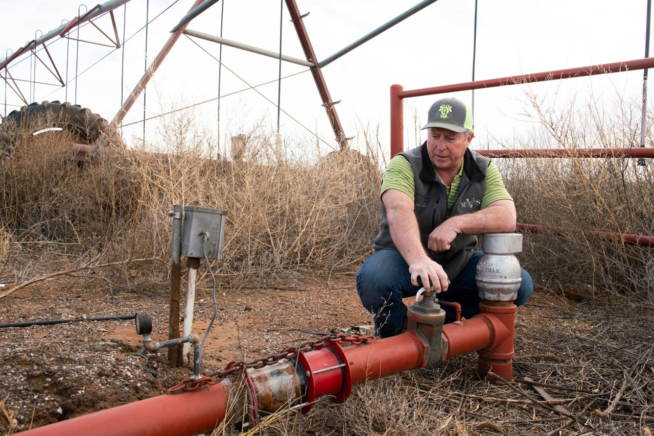 Art Schaap at the most contaminated of his wells, just outside the fence of Cannon Air Force Base.