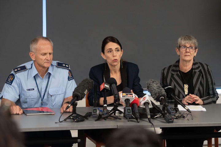 Prime Minister of New Zealand Jacinda Ardern (C) with New Zealand Police Superintendent Bruce Bird (L) and Whakatane Mayor Judy Turner (R) speak to the media about the eruption of Whakaari/White Island during a press conference in Whakatane on December 10, 2019