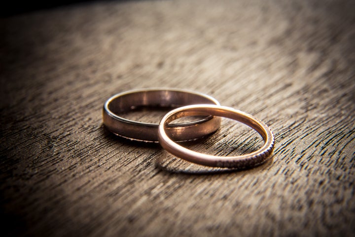 Wedding rings on wood