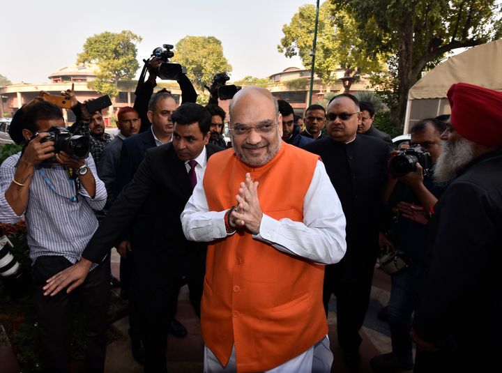 Union Home Minister Amit Shah arrives to attend the ongoing winter session of Parliament on December 9, 2019.