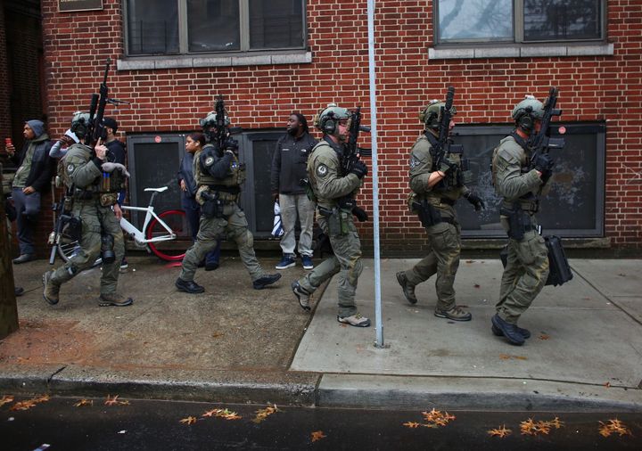 Police officers on the scene of a gun battle in New Jersey 