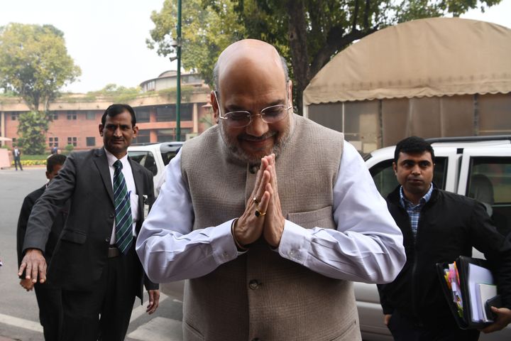 Amit Shah as he arrives at the Parliament House in New Delhi on December 11.