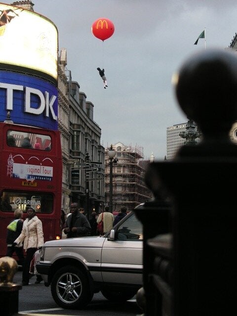 The stunt in London's busy Piccadilly Circus was one of several floating installations that Banksy unleashed in the English capital.