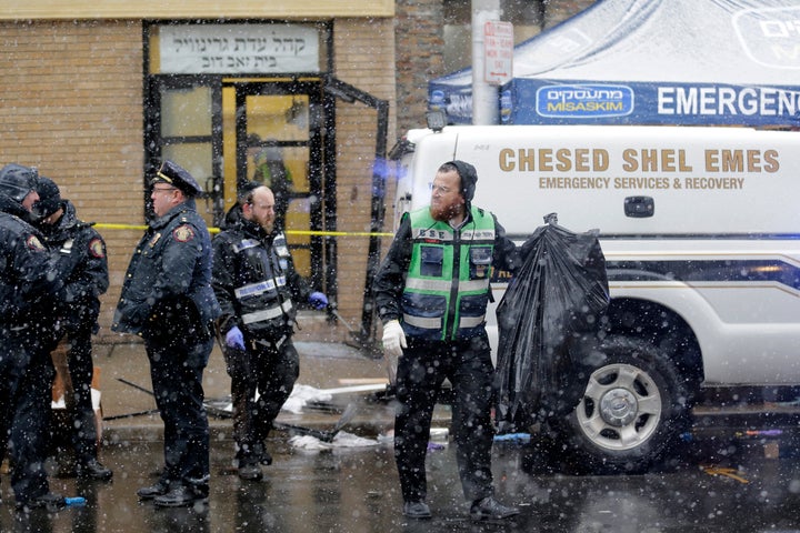 Emergency responders at a Jersey City kosher market where four people <a href="https://www.huffpost.com/entry/jersey-city-shooters-targeted-jewish-market_n_5df0f717e4b06a50a2e8085f" target="_blank" data-ylk="subsec:paragraph;cpos:2;elm:context_link;itc:0" data-rapid-parsed="slk" data-rapid_p="1" data-v9y="1" role="link" class=" js-entry-link cet-internal-link" data-vars-item-name="died during a shootout" data-vars-item-type="text" data-vars-unit-name="5ebaebcdc5b6894ab8b8f5c8" data-vars-unit-type="buzz_body" data-vars-target-content-id="https://www.huffpost.com/entry/jersey-city-shooters-targeted-jewish-market_n_5df0f717e4b06a50a2e8085f" data-vars-target-content-type="buzz" data-vars-type="web_internal_link" data-vars-subunit-name="article_body" data-vars-subunit-type="component" data-vars-position-in-subunit="8">died during a shootout</a>, including two Jewish Americans, on Dec. 11, 2019.