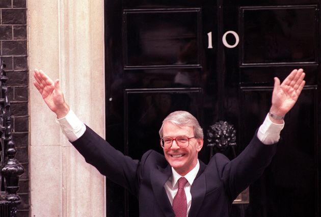 John Major waves to supporters in Downing Street after victory in the 1992 general election.