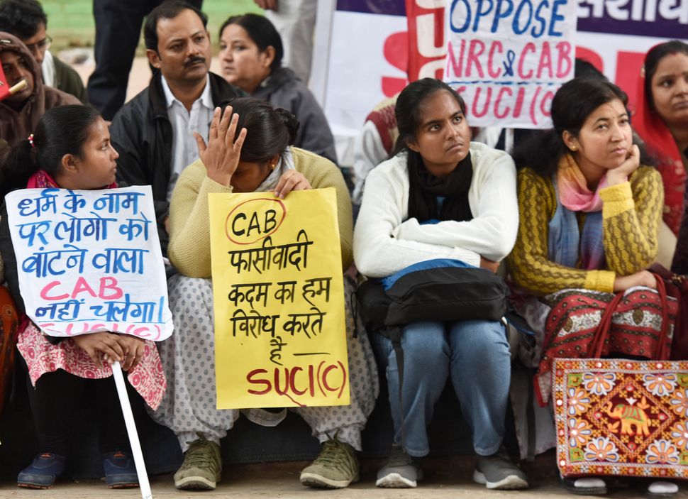 People from the northeastern states and CPI (M) workers during a protest against the government and the Citizenship Amendment Bill (CAB), on December 11, 2019 in New Delhi.