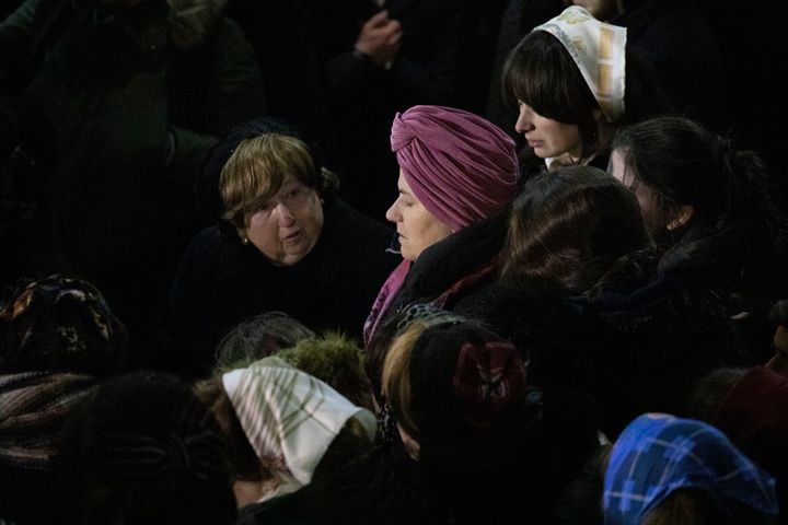 Orthodox Jewish women attend Moshe Deutsch's funeral. (AP Photo/Mark Lennihan)