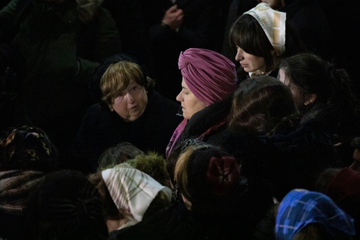 Orthodox Jewish women attend Moshe Deutsch's funeral. (AP Photo/Mark Lennihan)
