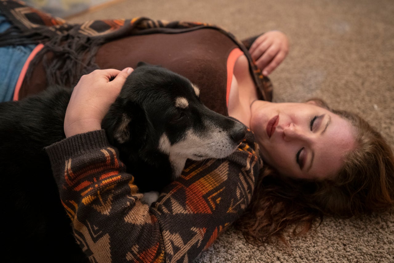 Tamara Campbell says that her dog, Bandit, is her protector. She said once, when her ex-husband had cocked his arm back to hit her, Bandit lunged and sank his teeth into his arm. Unfortunately, Campbell says, the abuse was then redirected at the dog, who was viciously beaten. (Melissa Lyttle for HuffPost)