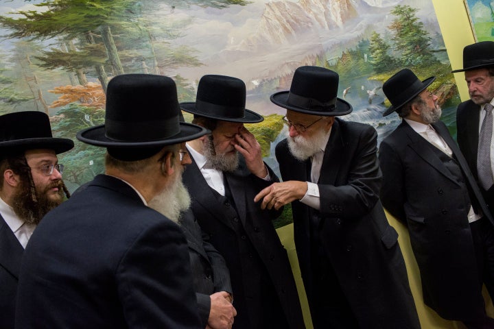 Satmar Orthodox community leaders attend a news conference Thursday with New York City Mayor Bill de Blasio to denounce the attack in Jersey City, New Jersey.