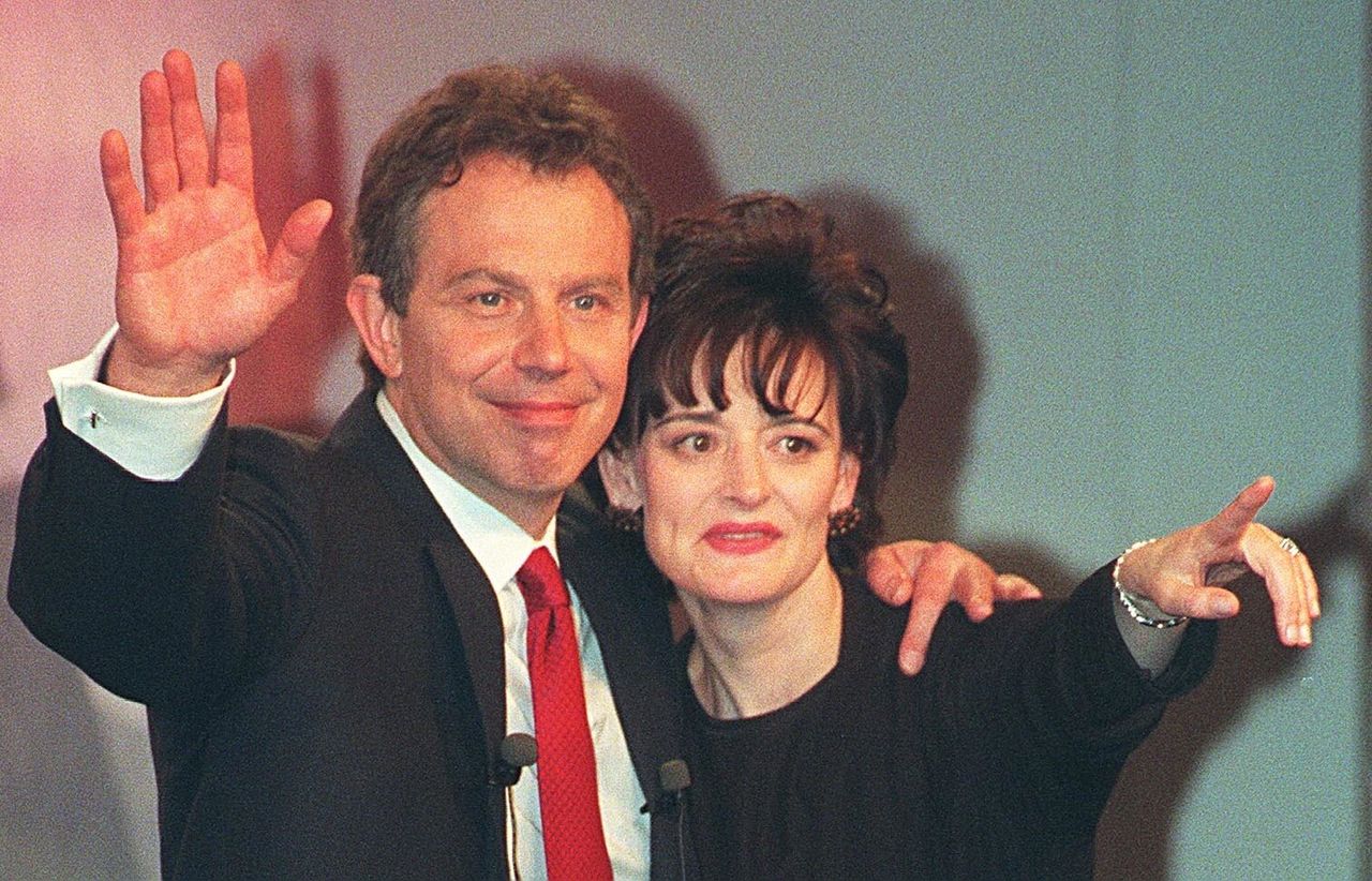 Tony Blair and his wife Cherie after Labour's landslide election victory in 1997 
