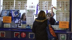 Absuelta tras no compartir con su grupo de lotería un premio a la