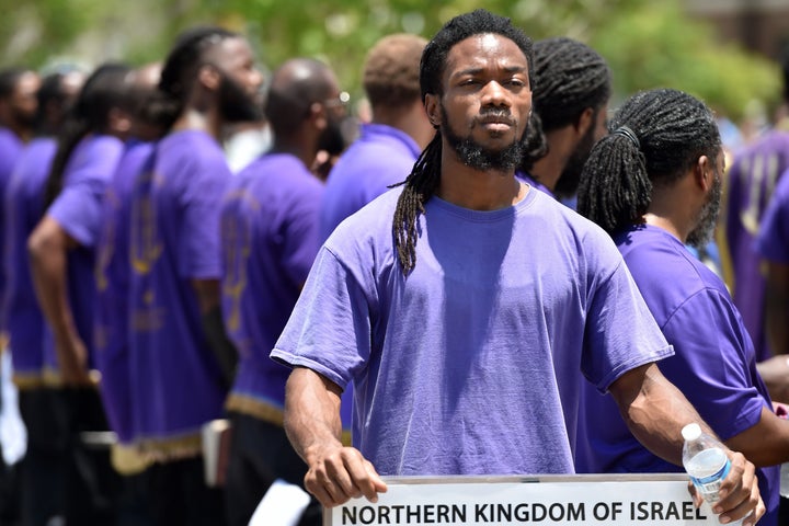 Members of the Black Hebrew Israelites gather for a prayer at the Emanuel AME Church, in Charleston, South Carolina on June 21, 2015. 