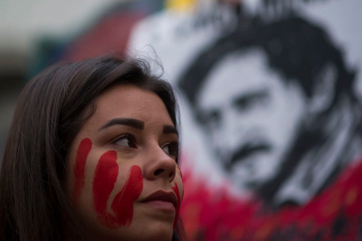 A women looks on during a protest in defense of the Amazon and protest against deforestation and forest fires on August 23, 2019, in Rio de Janeiro, Brazil.