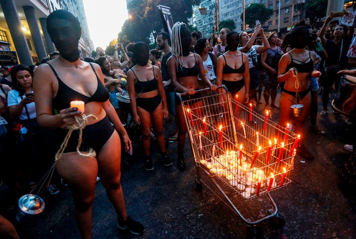 Women take part in a demonstration to mark International Women's Day in Rio de Janeiro, on March 8, 2019.