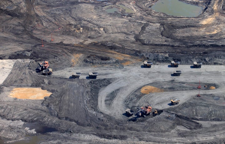 Oilsands mining operations at the Syncrude project near Fort McMurray, Alta., June 13, 2017.