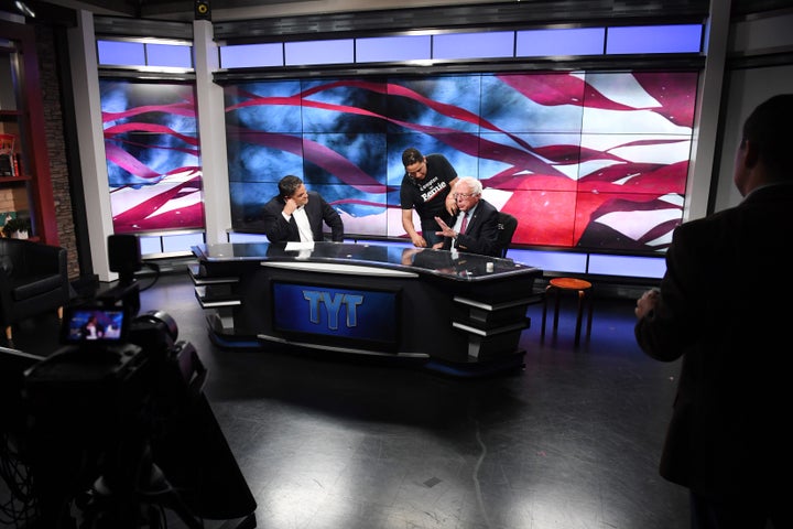 Sen. Bernie Sanders prepares for an interview with Cenk Uygur, left, at the Young Turks studios in Culver City, California, during his 2016 presidential run. Uygur had long been a key ally.