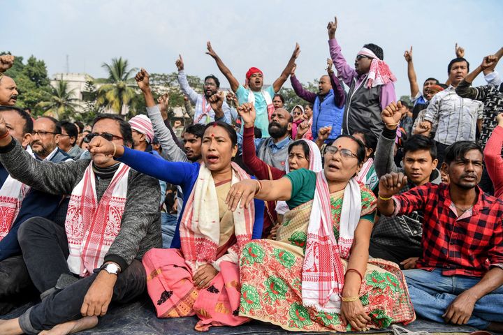 Demonstrators shout slogans during a protest against the government's Citizenship Amendment Bill (CAB) in Guwahati on December 13, 2019.