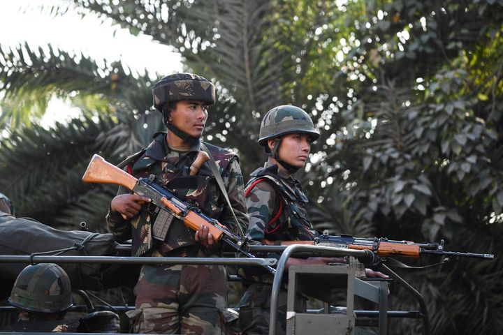 Soldiers guard a street in Guwahati on December 13, 2019.